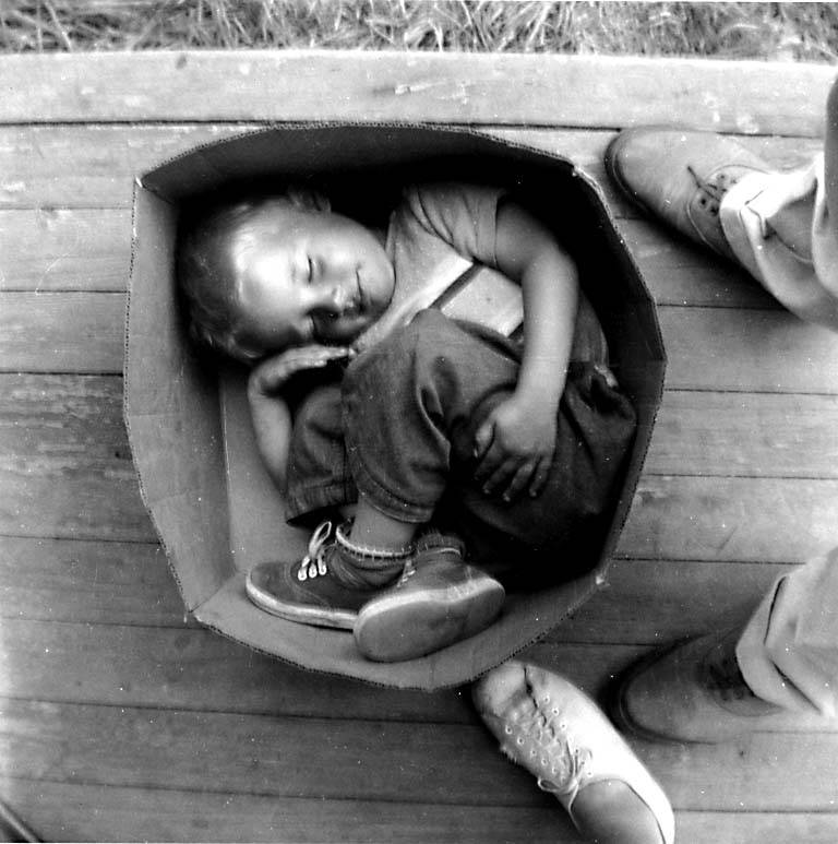 Boy asleep in cardboard box, Hooverville, ca. 1933. Photographer Victor Steinbrueck (c) Boy asleep in cardboard box, Hooverville, ca. 1933. Photographer Victor Steinbrueck Boy asleep in cardboard box, Hooverville, ca. 1933. Photographer Victor Steinbrueck (c) Boy asleep in cardboard box, Hooverville, ca. 1933. Photographer Victor Steinbrueck